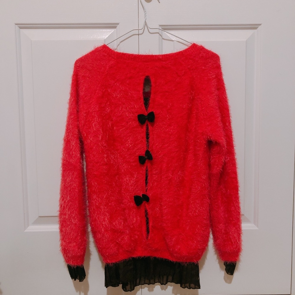 Brand new pink one piece sweater with ribbons